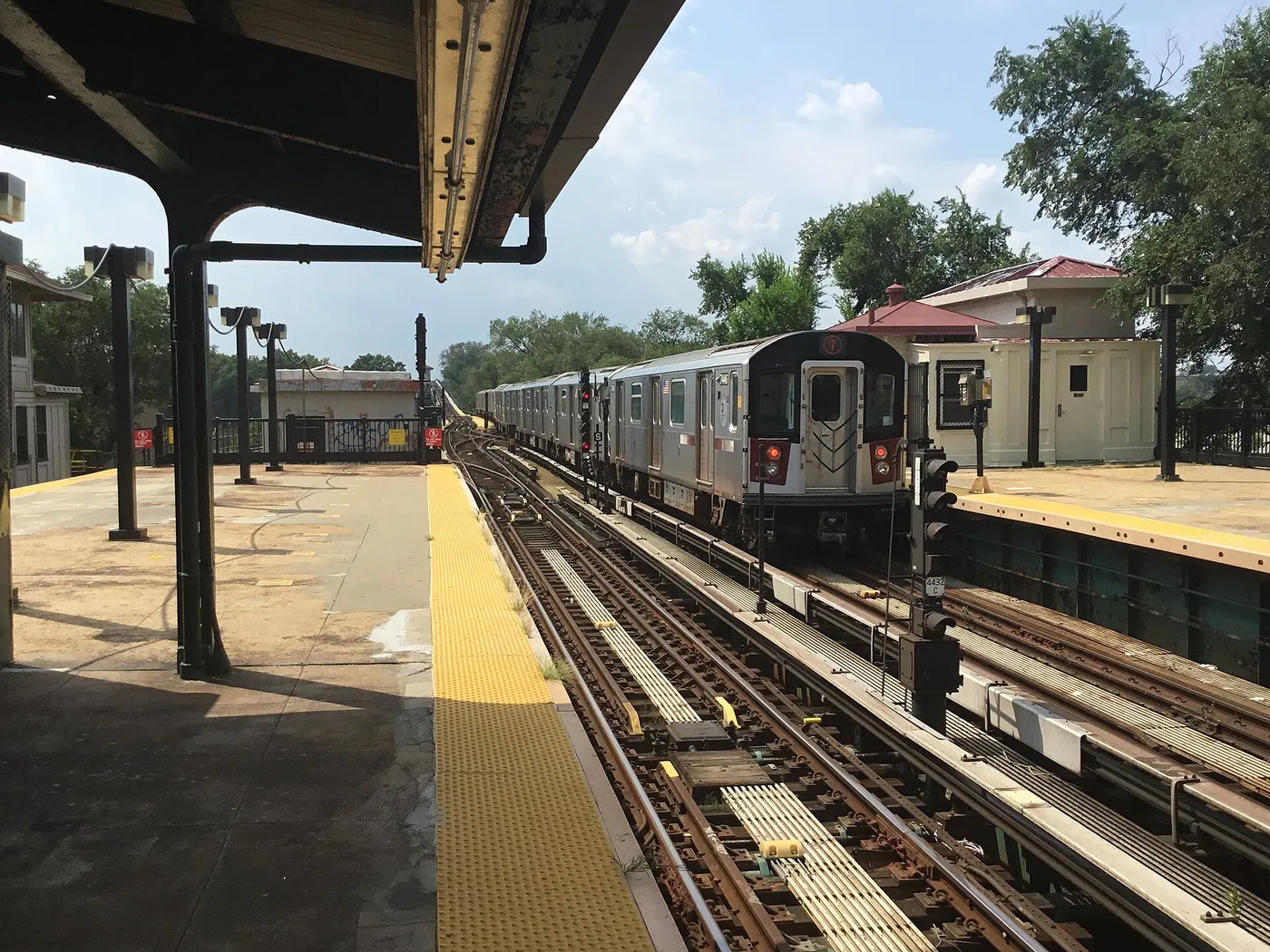 A number 7 subway train stopped at Mets-Willets Point station