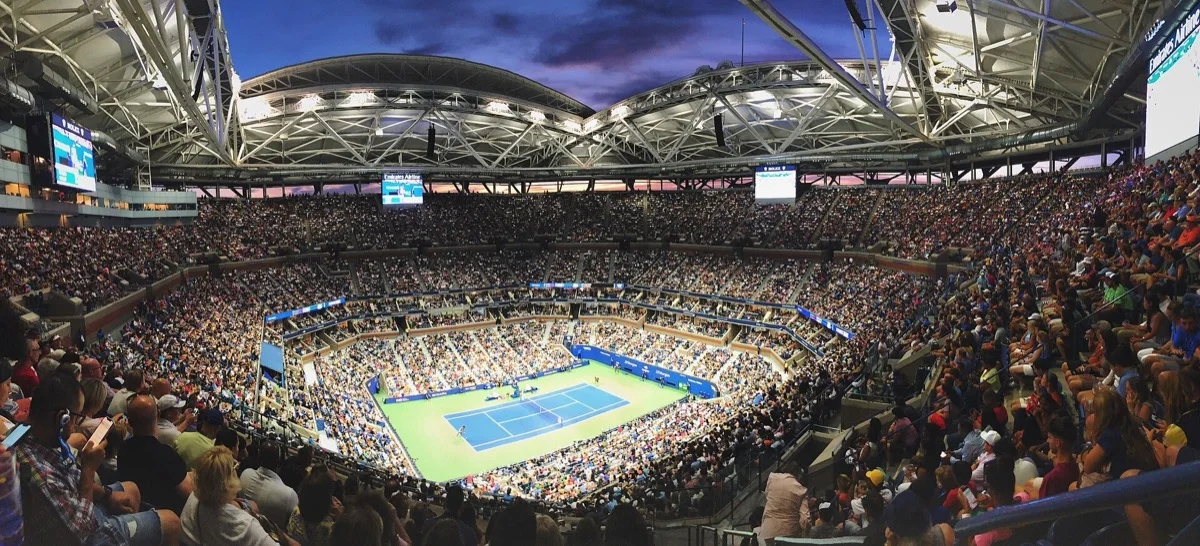 Arthur Ashe Stadium full of spectators during an evening US Open match